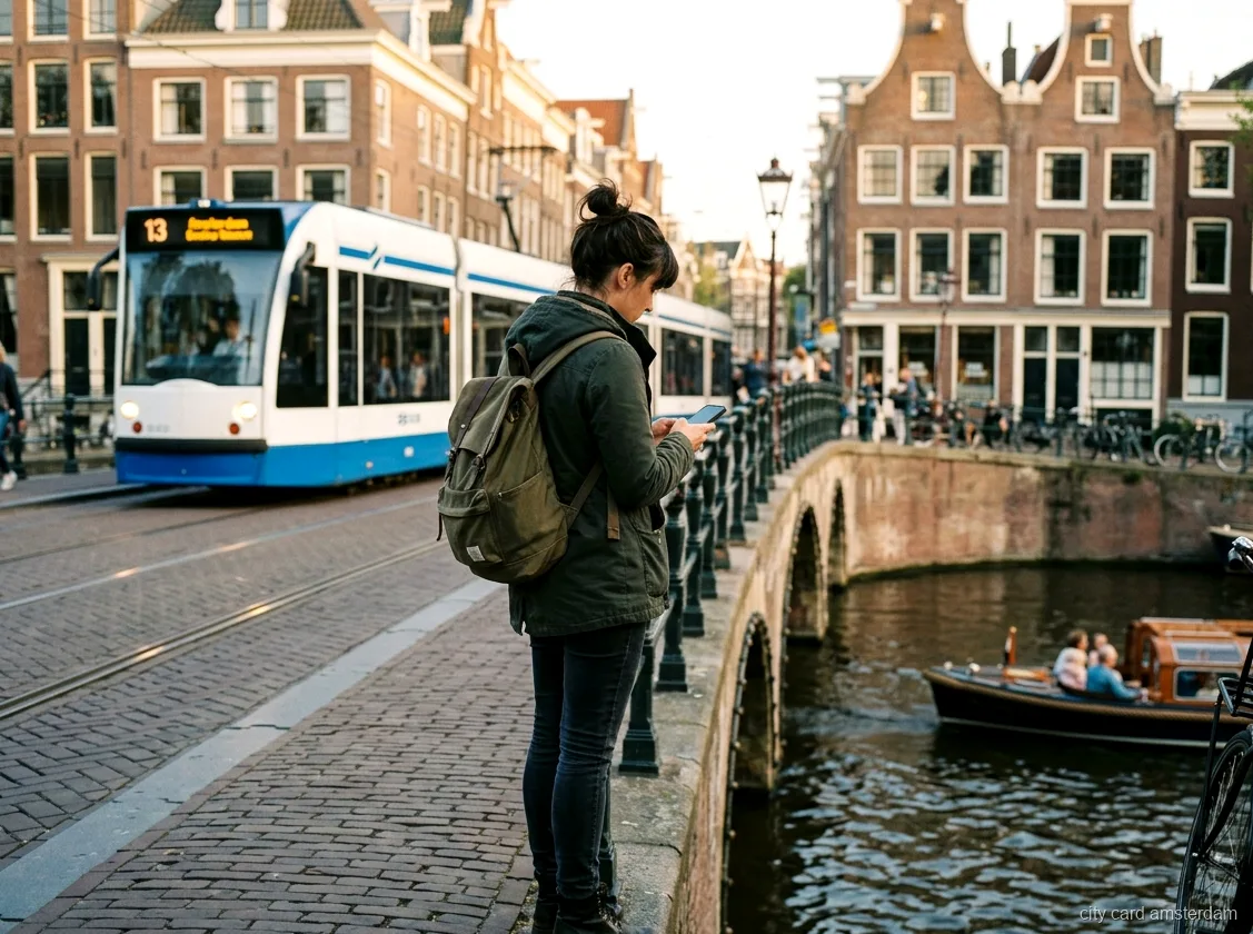 Go City Amsterdam All Inclusive Pass: traveler checking a phone by a canal with trams passing